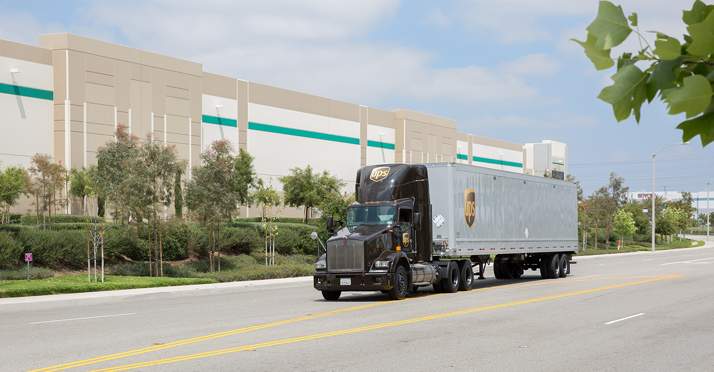 UPS trailer truck driving on road